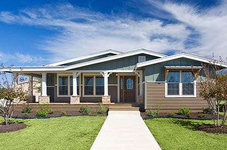 Nice new large Texas manufactured home with beautiful multi-tone siding and roof lines